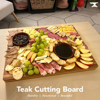 Federal Brace Teak Cutting Board with Handle Grips, in Use View