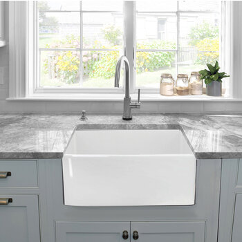 Nantucket Sinks Cape 23-1/4'' W Premium European Fireclay Farmhouse Kitchen Sink in White with Bottom Grid and Strainer, 23-1/4'' W x 18'' D x 10'' H, In Use Front View