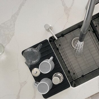 Silicone Drying Mat and Trivet in Black, In Use