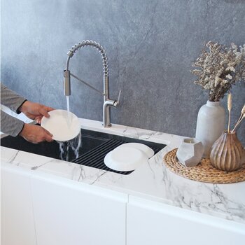 Stylish International Tivoli Single Handle Pull Down Kitchen Faucet in Stainless Steel, In Use View