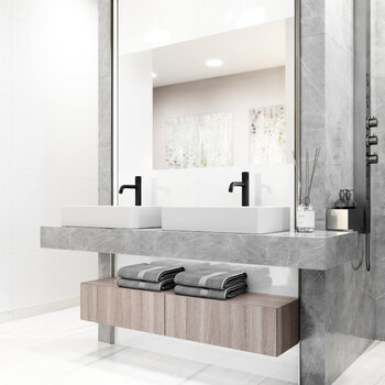 VIGO Magnolia MatteStone™ Collection Vessel Bathroom Sink with Apollo Bathroom Faucet and Pop-Up Drain in Matte Black, Installed Angle View